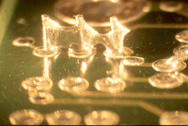 Figure 2: Inconsistent fluxing likely caused these solder flags Figure 2: Inconsistent fluxing likely caused these solder flags